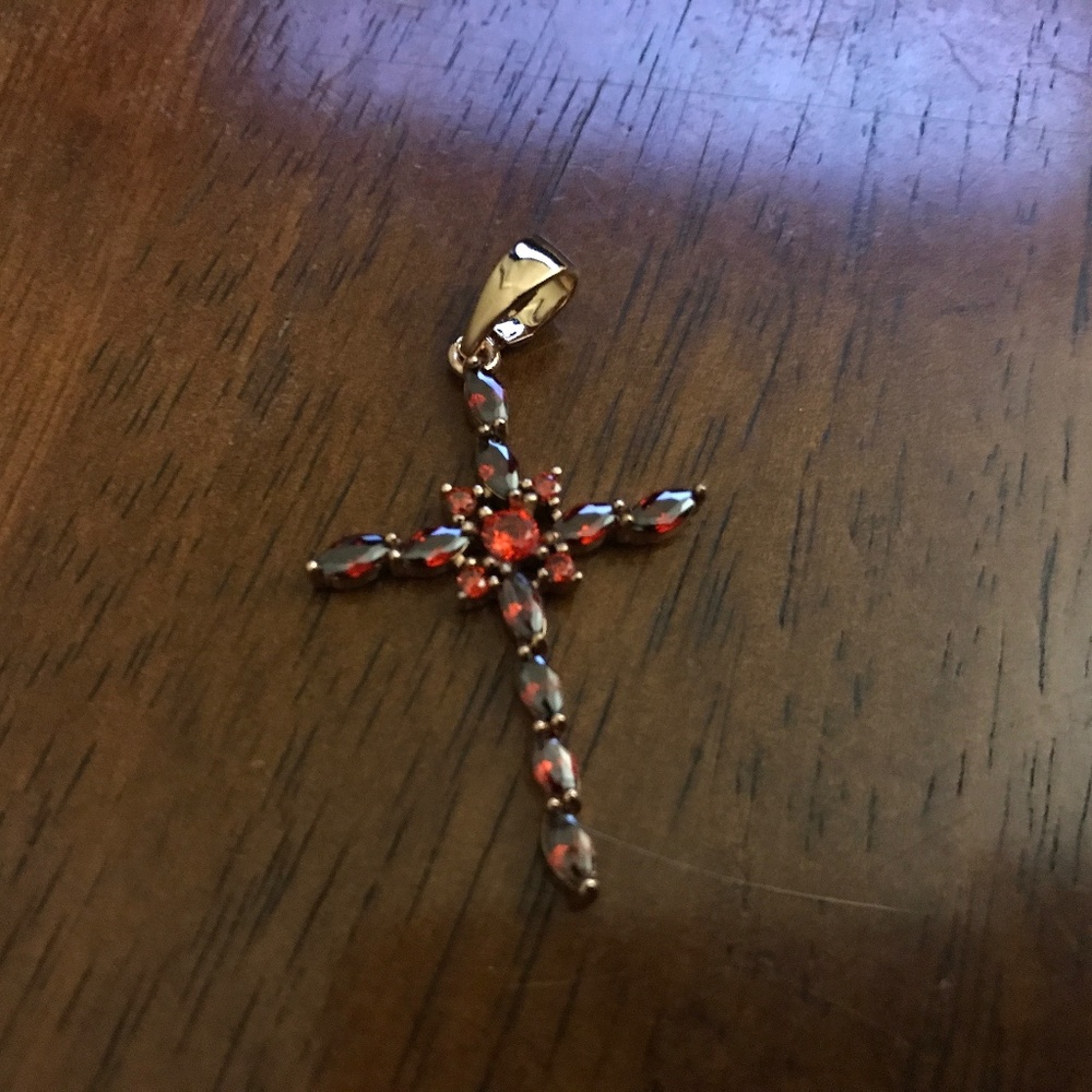 red stone gold washed cross pendant